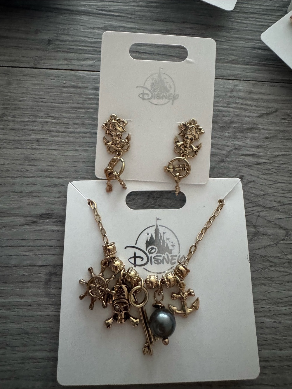 Disney Pirates of the Caribbean Charm Necklace & Earring Set